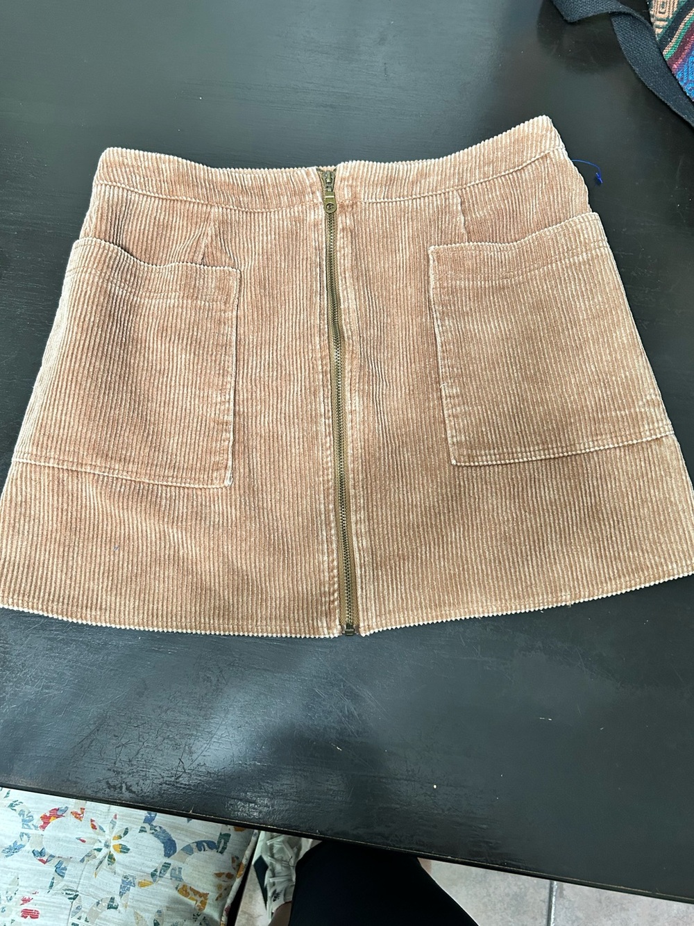 Corduroy Front-Zip Mini Skirt in Tan